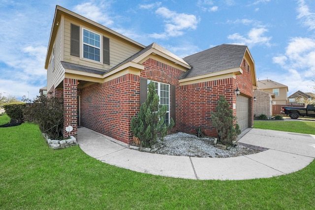 view of front facade with driveway, an attached garage, a front yard, and brick siding