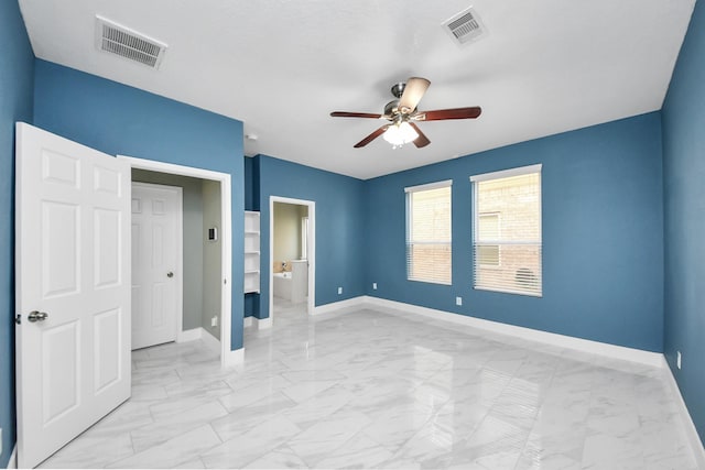 unfurnished bedroom with a ceiling fan, marble finish floor, visible vents, and baseboards