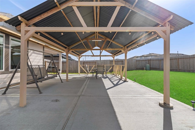 view of patio featuring a fenced backyard and a gazebo