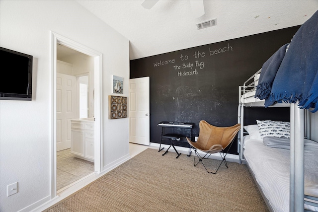 bedroom with a ceiling fan, carpet, visible vents, and baseboards