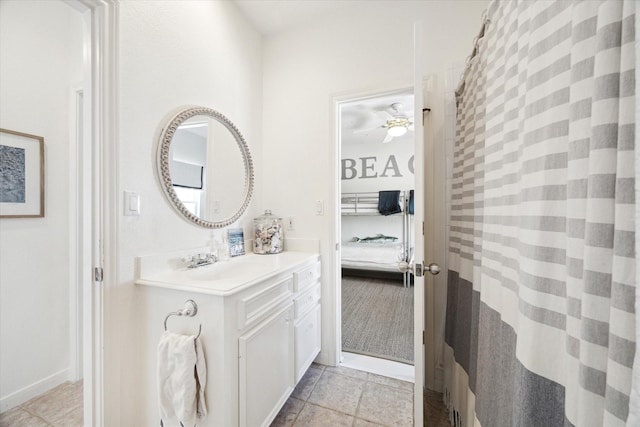 ensuite bathroom with curtained shower, connected bathroom, vanity, and a ceiling fan