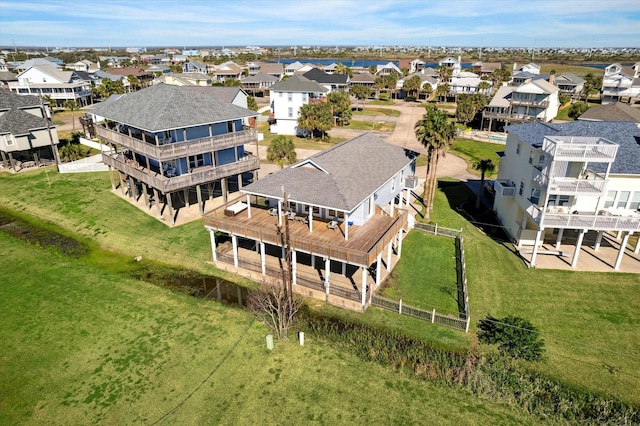 birds eye view of property with a residential view