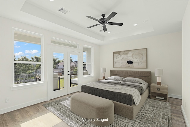 1807 Palmetto Landing Dr, Houston, TX 77009 - bedroom with a tray ceiling, access to outside, baseboards, french doors, and recessed lighting
