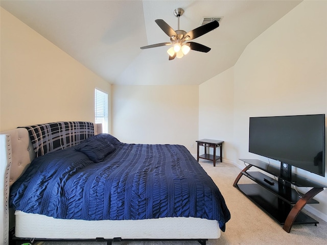 carpeted bedroom featuring vaulted ceiling, baseboards, visible vents, and a ceiling fan