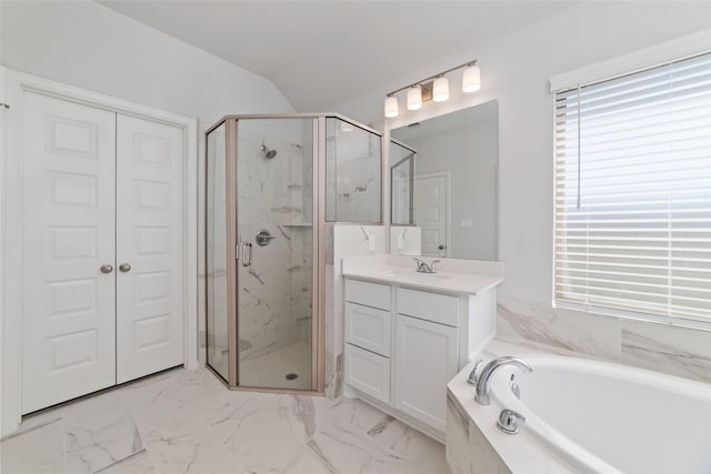 bathroom featuring marble finish floor, vanity, a marble finish shower, and a bath