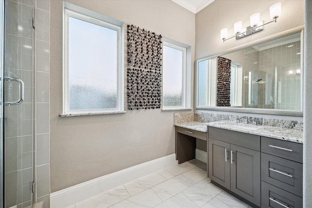 bathroom featuring a stall shower, baseboards, marble finish floor, crown molding, and vanity