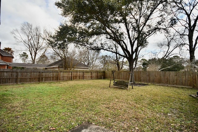 view of yard featuring a fenced backyard