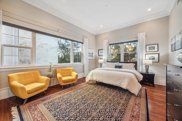 bedroom with crown molding, recessed lighting, visible vents, dark wood-type flooring, and baseboards