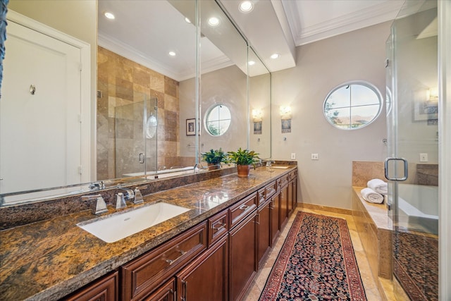 full bath with recessed lighting, a sink, baseboards, a shower stall, and crown molding