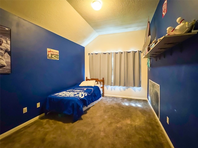 carpeted bedroom with vaulted ceiling, a textured ceiling, and baseboards