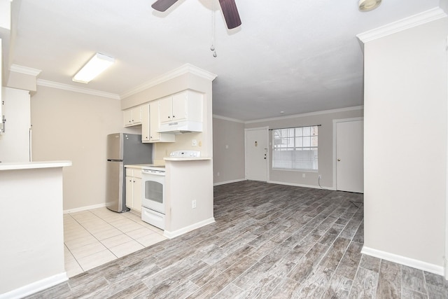 kitchen with crown molding, wood tiled floor, white electric stove, and under cabinet range hood