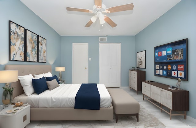 bedroom featuring a ceiling fan and visible vents