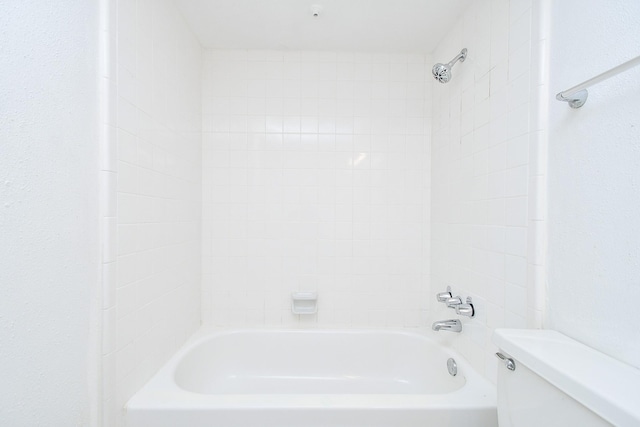 full bath featuring shower / bath combination and toilet