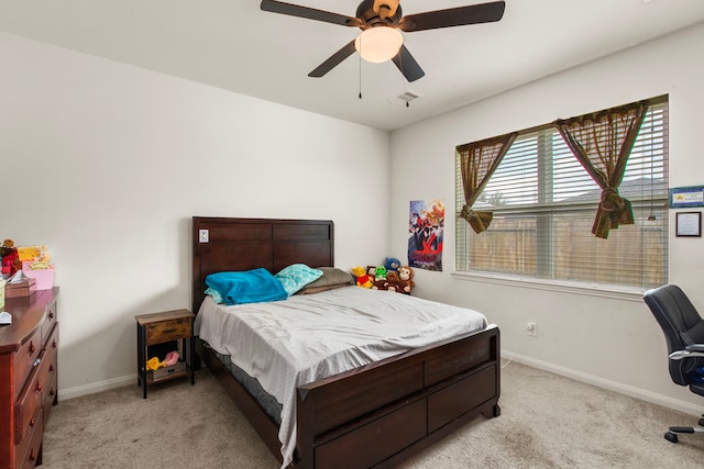 bedroom with light carpet, visible vents, baseboards, and a ceiling fan