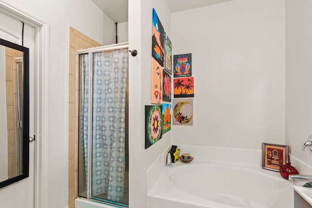 full bath with a shower stall and a bath