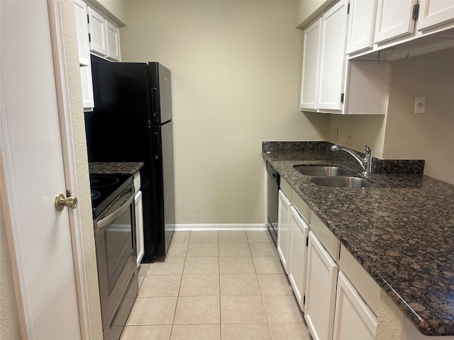 kitchen with dishwashing machine, light tile patterned floors, stainless steel range with electric cooktop, a sink, and baseboards