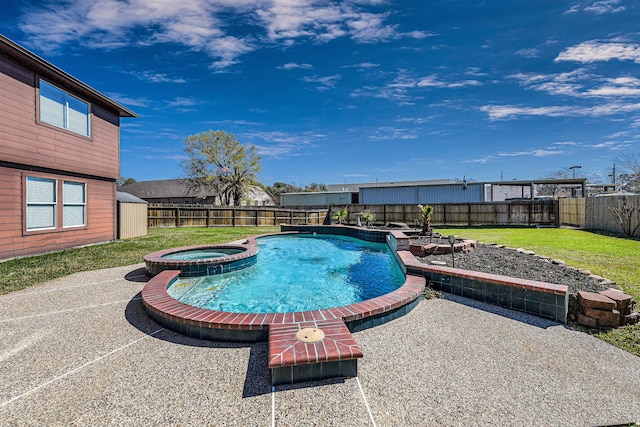 view of swimming pool with a pool with connected hot tub, a fenced backyard, a yard, and a patio