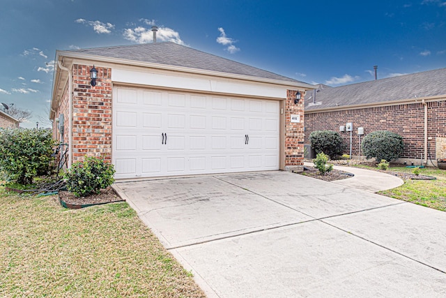 garage with driveway