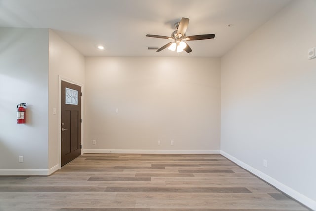 foyer entrance featuring recessed lighting, visible vents, ceiling fan, light wood-type flooring, and baseboards