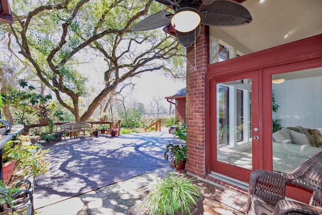 view of patio / terrace with french doors and a deck