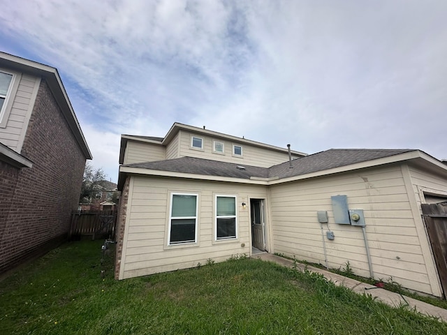 8218 Malago Point Dr, Cypress, TX 77433 - back of property with a lawn and fence