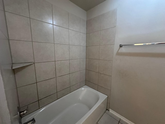 full bath with tile patterned flooring and baseboards