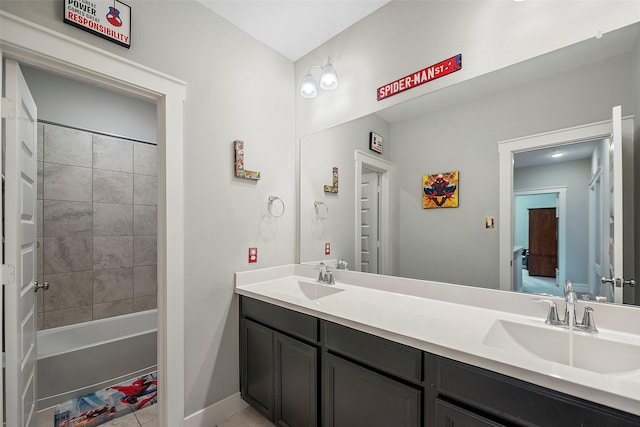 full bathroom featuring double vanity, shower / bath combination, and a sink