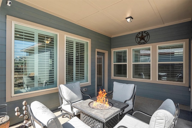 view of patio with an outdoor fire pit