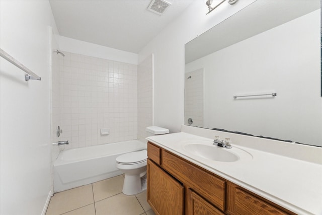 bathroom with visible vents, toilet, vanity,  shower combination, and tile patterned flooring