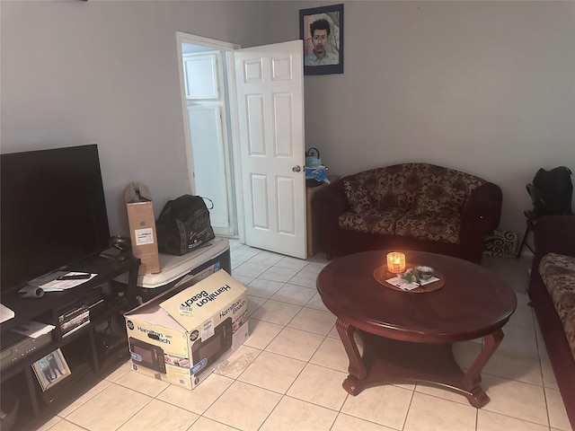 living area featuring light tile patterned floors