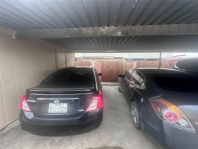 garage with fence