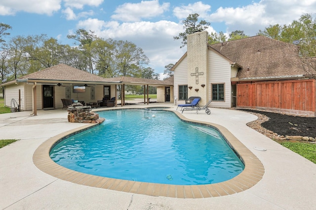 5503 Bayou Blvd, Baytown, TX 77521 - view of swimming pool with a patio, fence, a fenced in pool, and ceiling fan