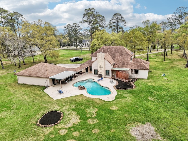 5503 Bayou Blvd, Baytown, TX 77521 - outdoor pool featuring a patio area and a yard