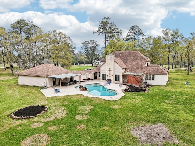 5503 Bayou Blvd, Baytown, TX 77521 - outdoor pool with a patio and a lawn