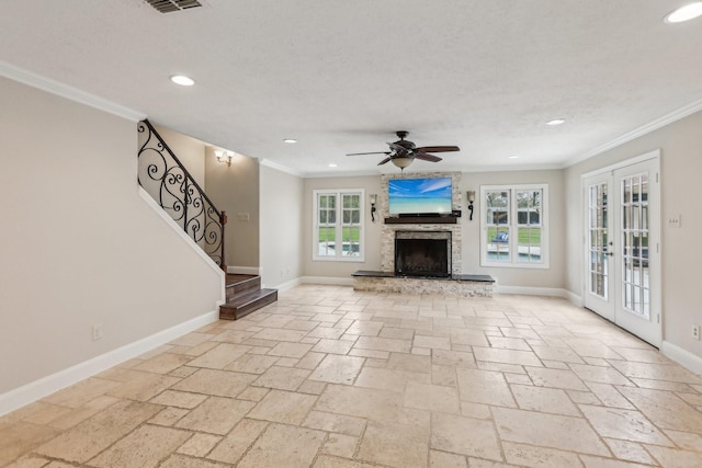 5503 Bayou Blvd, Baytown, TX 77521 - unfurnished living room with a healthy amount of sunlight, baseboards, french doors, and ornamental molding