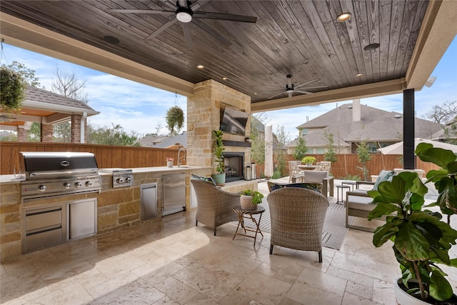 139 Ballantyne Dr, Montgomery, TX 77316 - view of patio with a ceiling fan, a grill, area for grilling, a fenced backyard, and outdoor dining space