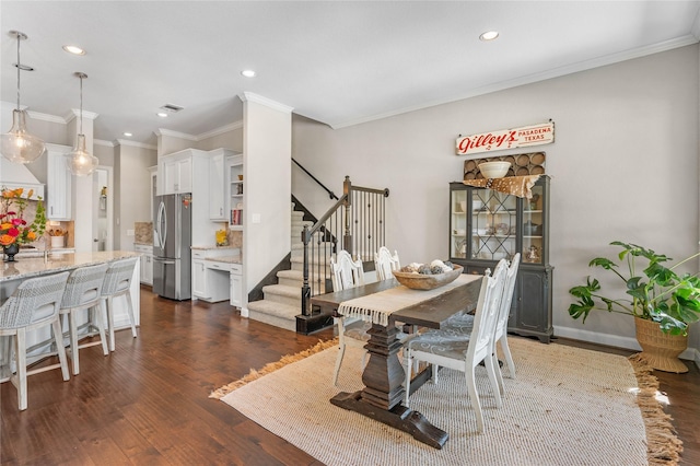 139 Ballantyne Dr, Montgomery, TX 77316 - dining area featuring visible vents, stairs, ornamental molding, recessed lighting, and dark wood finished floors