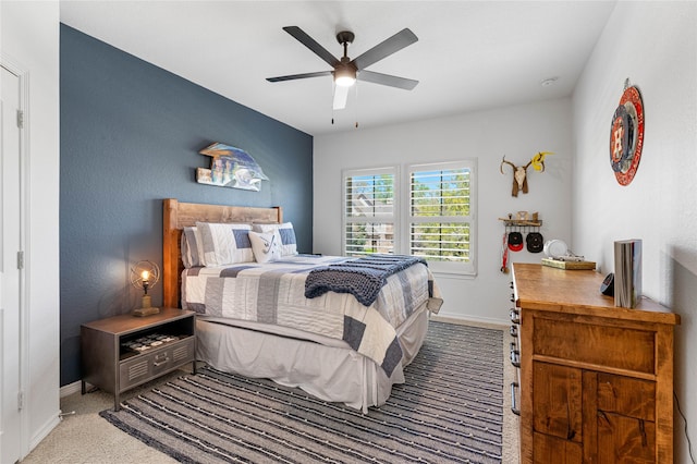 139 Ballantyne Dr, Montgomery, TX 77316 - carpeted bedroom with baseboards and a ceiling fan
