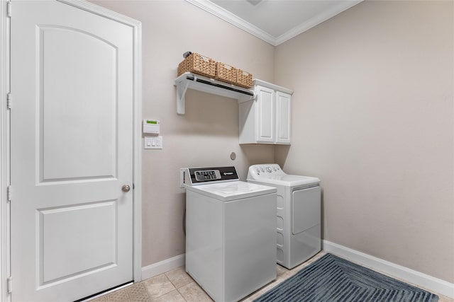 139 Ballantyne Dr, Montgomery, TX 77316 - clothes washing area featuring ornamental molding, cabinet space, baseboards, and separate washer and dryer