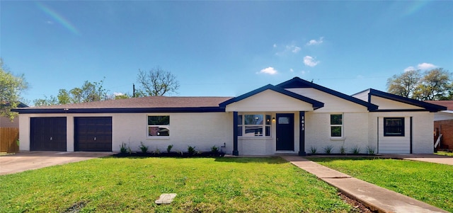 ranch-style home featuring a garage, brick siding, driveway, and a front yard