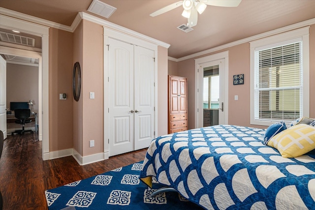 172 Ocean View Dr, Crystal Beach, TX 77650 - bedroom featuring wood finished floors, a desk, a closet, crown molding, and ceiling fan