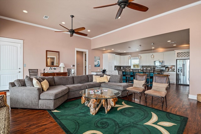 172 Ocean View Dr, Crystal Beach, TX 77650 - living room featuring ceiling fan, crown molding, dark wood-style floors, and recessed lighting