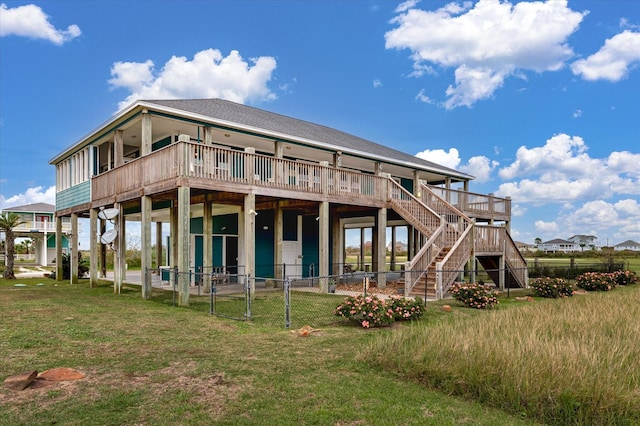 172 Ocean View Dr, Crystal Beach, TX 77650 - rear view of property with a deck and stairs