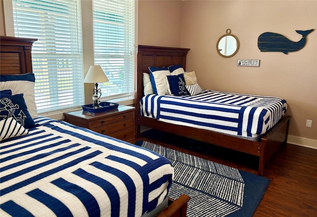 172 Ocean View Dr, Crystal Beach, TX 77650 - bedroom with wood finished floors and baseboards