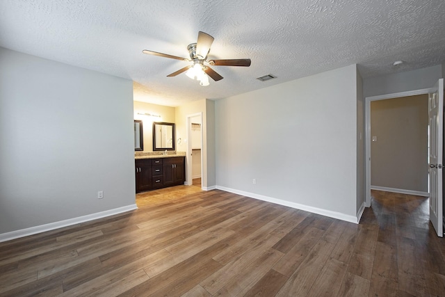 13418 Natasha Ln, Houston, TX 77015 - unfurnished bedroom featuring visible vents, baseboards, and wood finished floors
