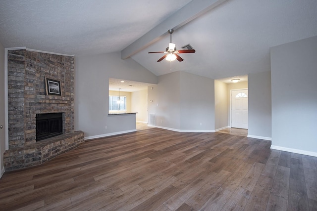 unfurnished living room featuring a brick fireplace, baseboards, a ceiling fan, and wood finished floors