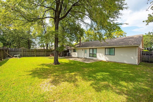 exterior space featuring a fenced backyard and a patio area