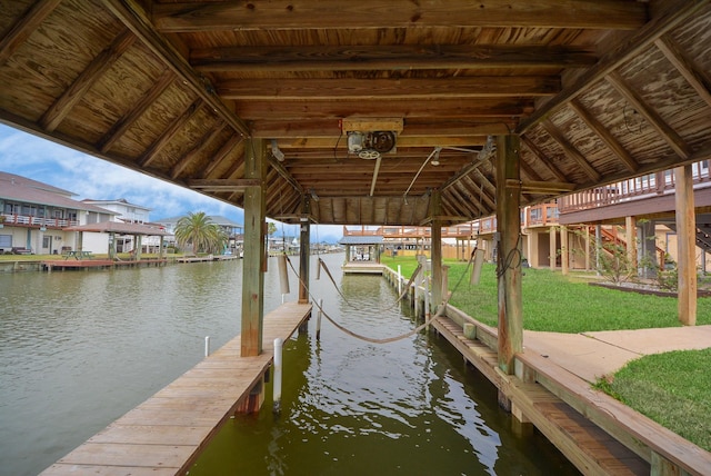 dock area with a water view