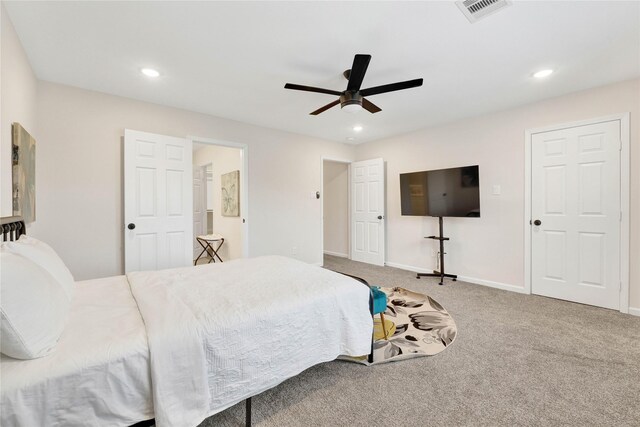 carpeted bedroom featuring recessed lighting, visible vents, ceiling fan, and baseboards