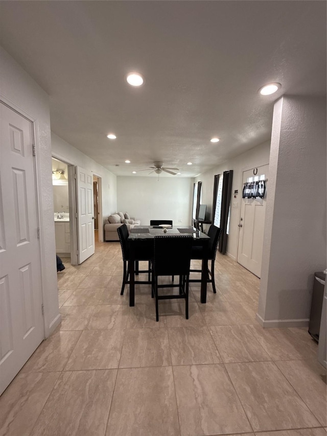 dining area featuring recessed lighting, ceiling fan, and baseboards